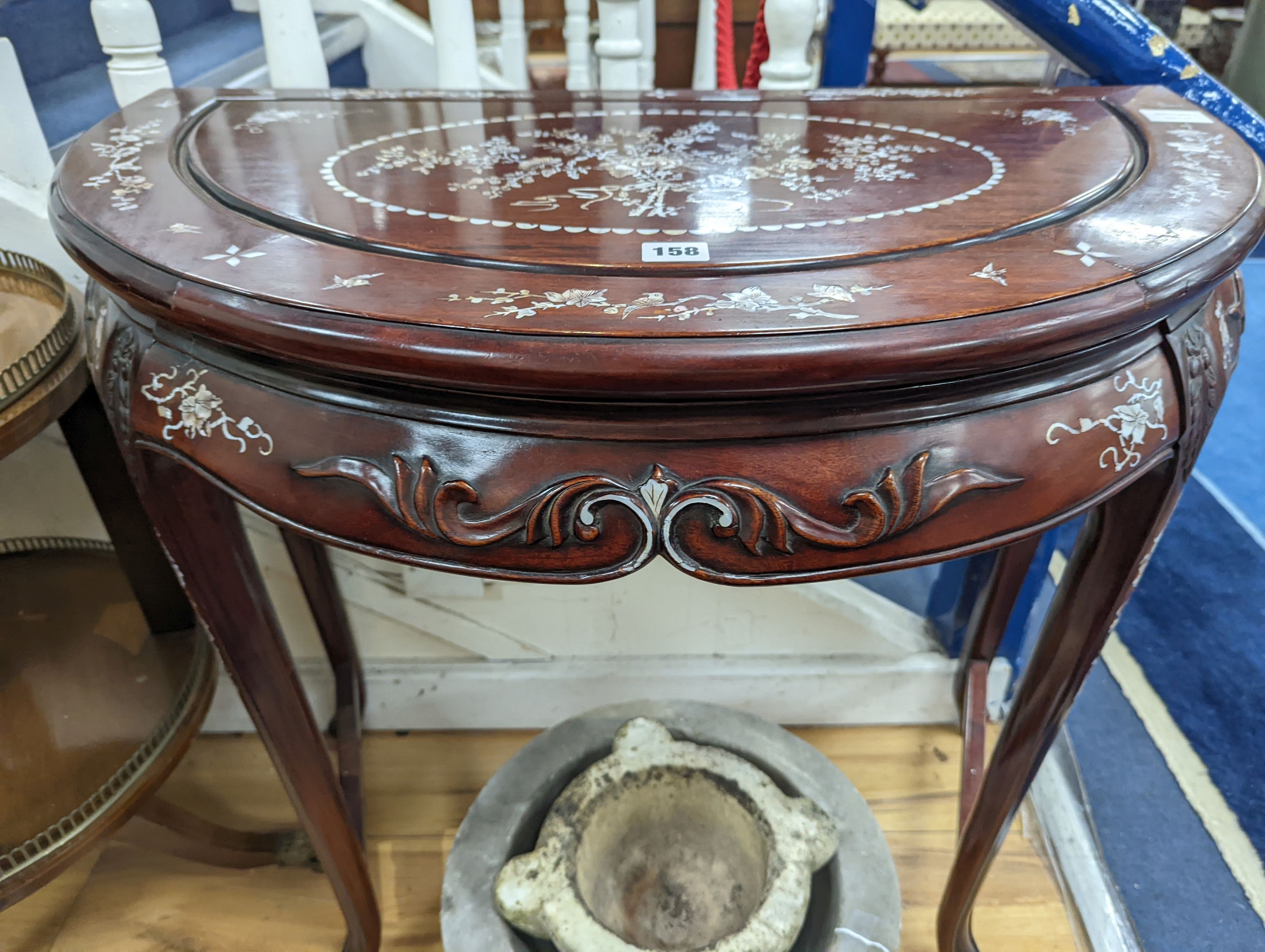 A Chinese hardwood and mother-of-pearl inlaid demi lune side table, width 80cm, depth 45cm, height 76cm